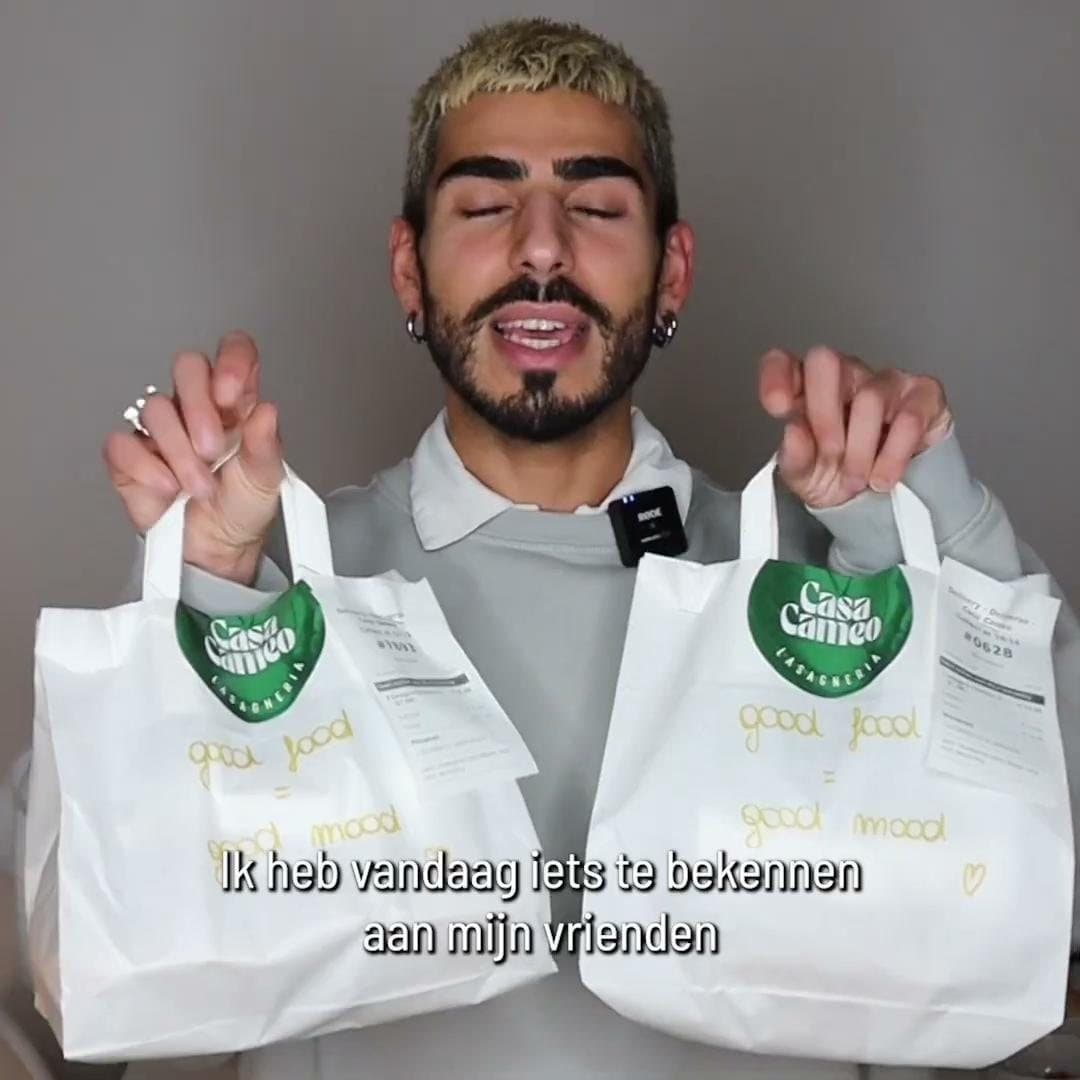 An influencer holding Casa Cameo delivery bags